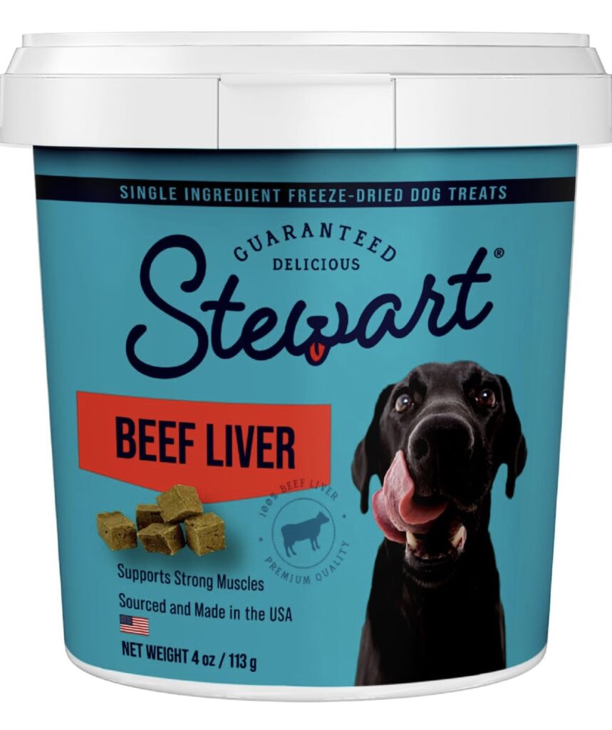 Container of Stewart Freeze-Dried Beef Liver Dog Treats, 4 oz, featuring single-ingredient, USA-made treats with a happy black dog illustration on the label.