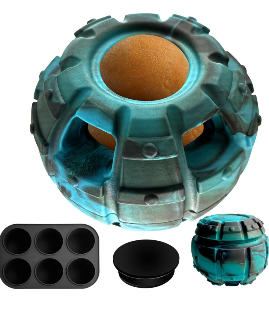 Durable teal dog treat ball with baking mold and stopper attachments for enrichment activities.